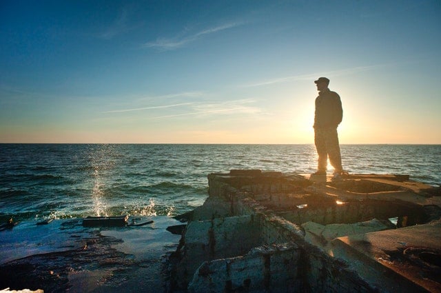 man standing near the edge of concrete | The dream we haven't dared to dream | self awareness and self development